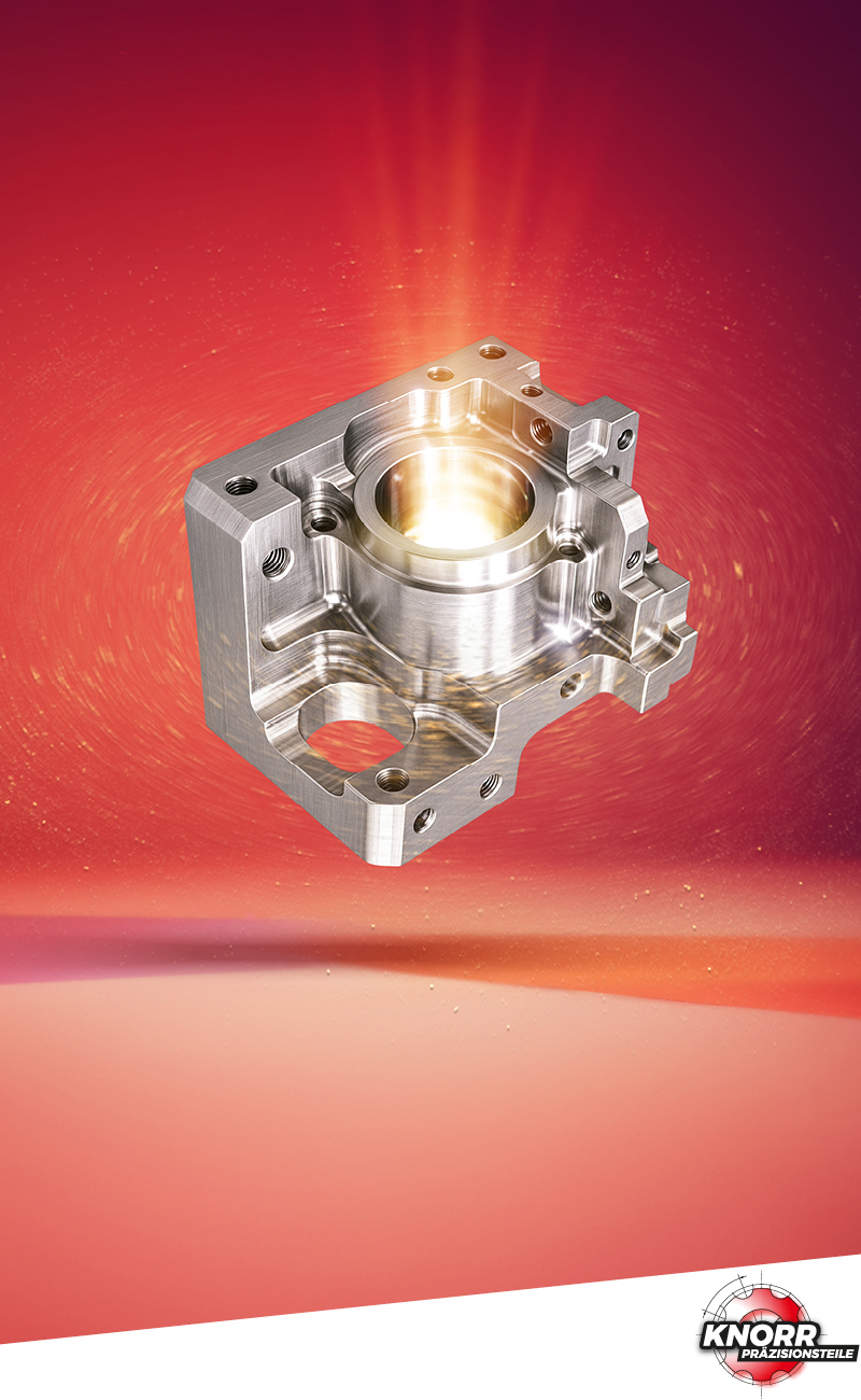 Ein leuchtendes Metallobjekt, das einen hellen Lichtstrahl aussendet.